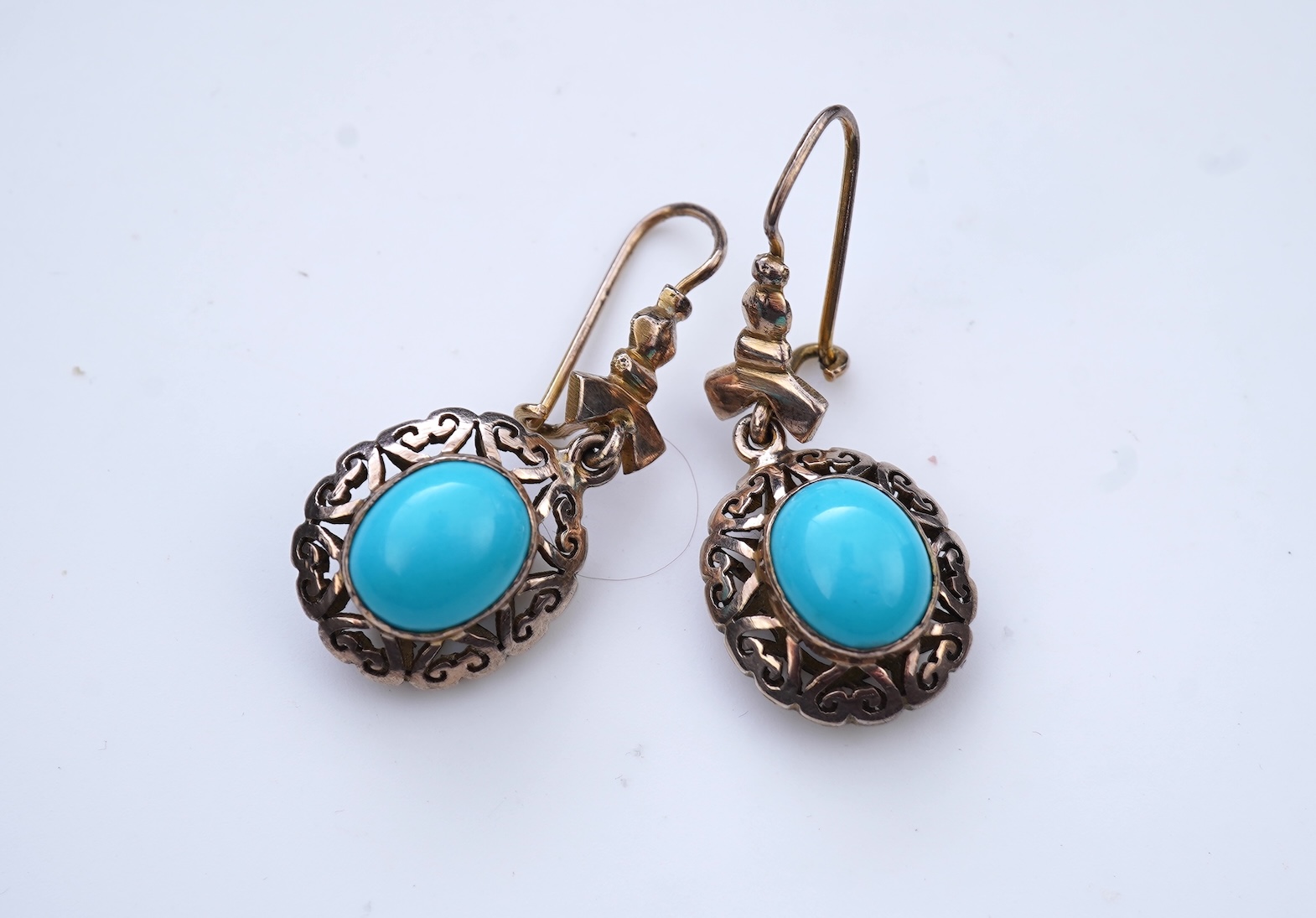 A pair of simulated turquoise earrings
